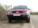 Передний бампер DDengineer для Mitsubishi L200 2006- без дуги